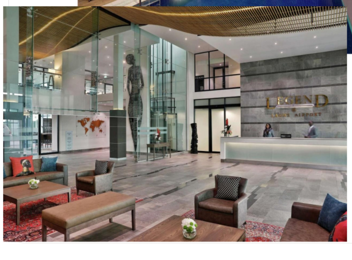 Legend Hotel lobby with reception desk and lounge seating