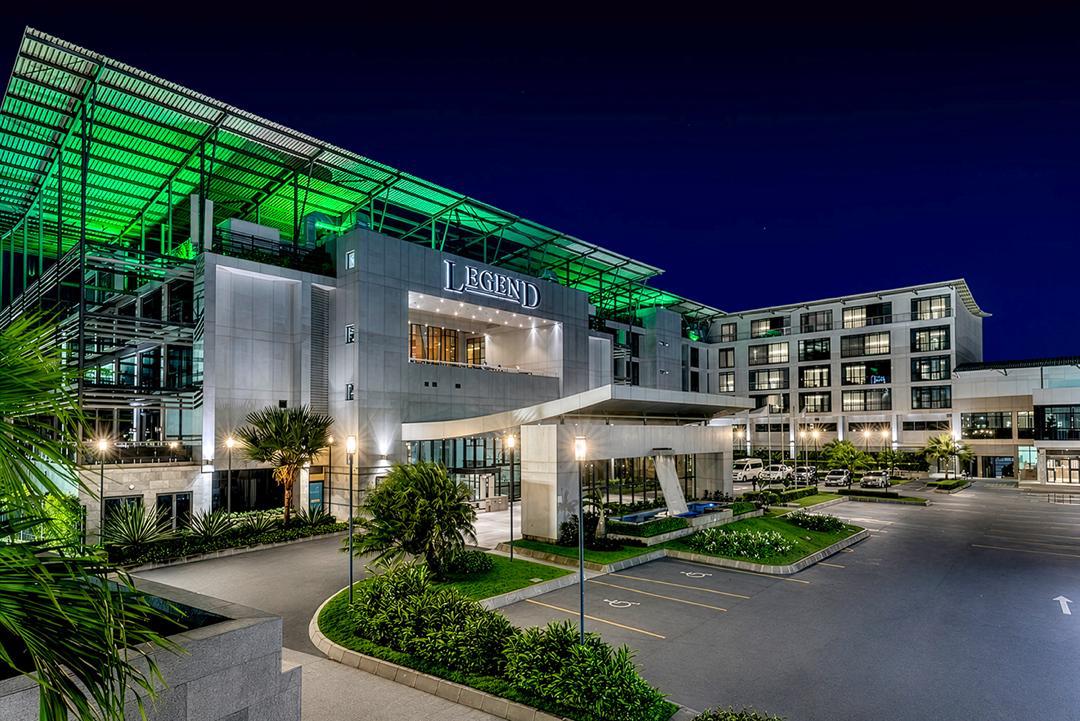 Quits Aviation Centre and Legend Hotel illuminated at night with architectural lighting at Murtala Muhammed International Airport